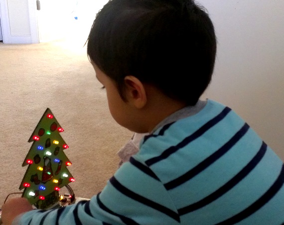 My son (Rey) playing with his new Christmas toy