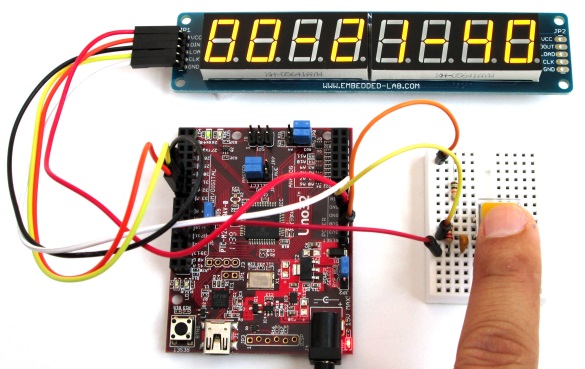 Digital stopwatch displays time on seven segment LEDs